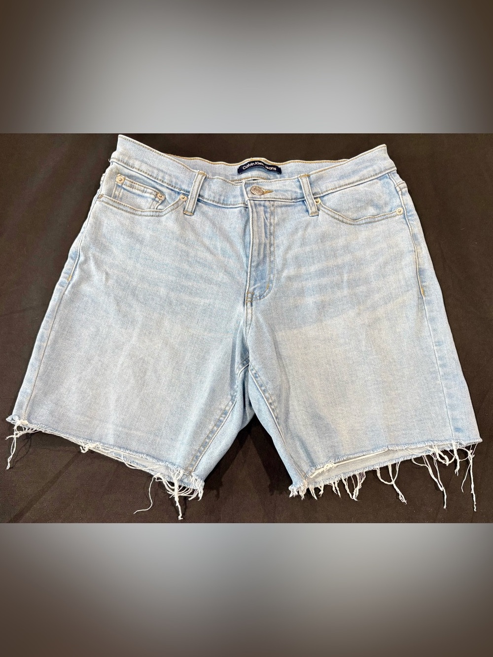 Calvin Klein Jeans Faded Light Wash Denim Cutoff Shorts